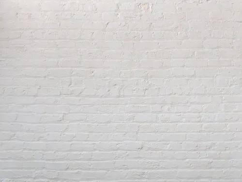 Cómo ajustar una loseta de PVC a la pared